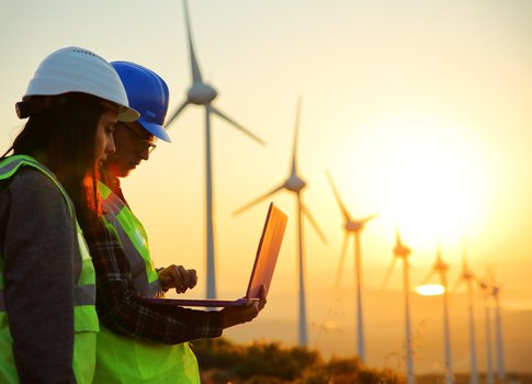 engineers evaluating data wind turbines